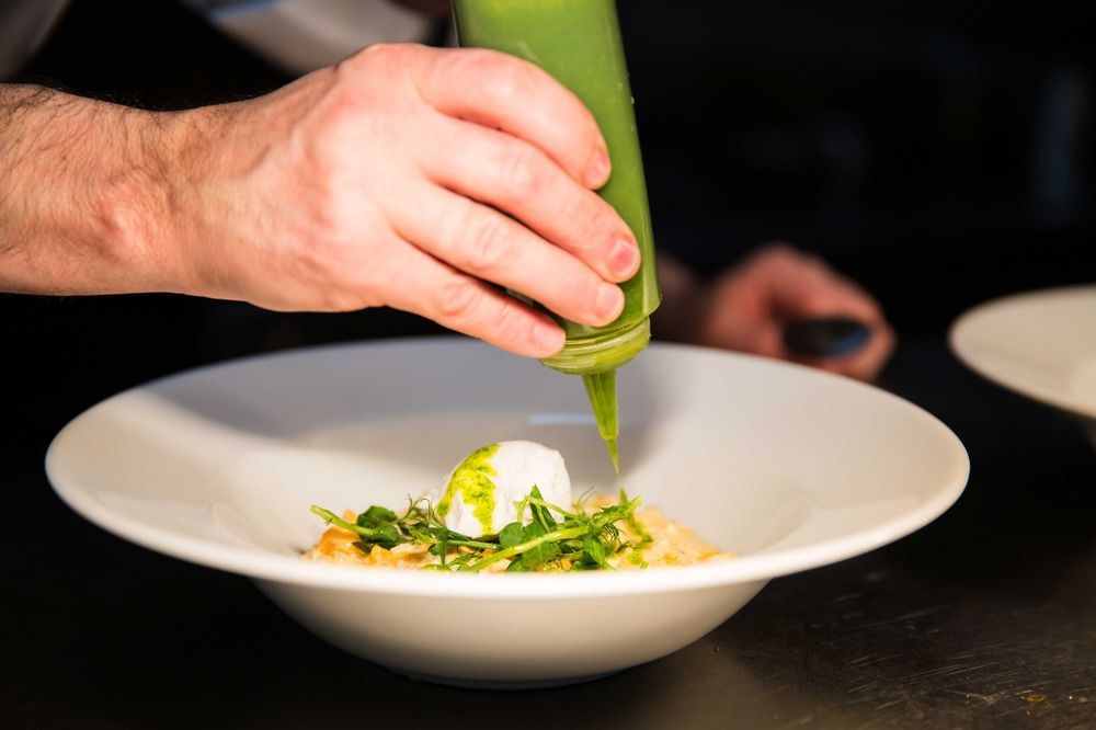The Millstone, Mellor 호텔 블랙번 외부 사진 A chef using a piping bag