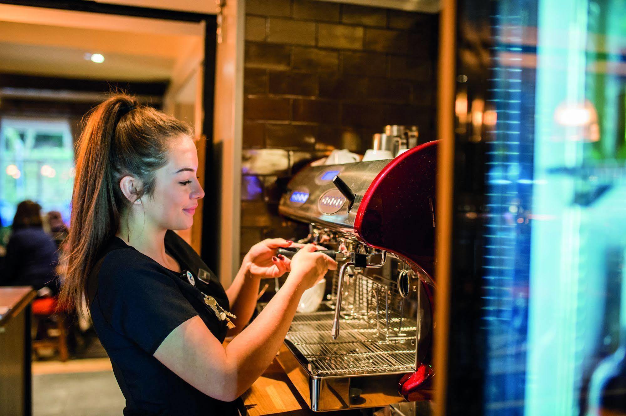 The Millstone, Mellor 호텔 블랙번 외부 사진 A barista making coffee